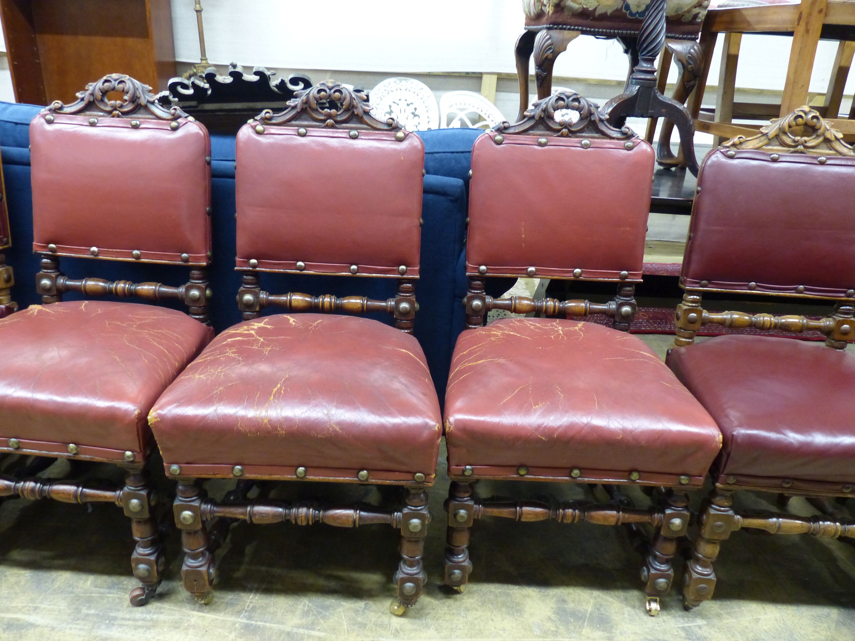 A set of ten Victorian 17th century style oak dining chairs